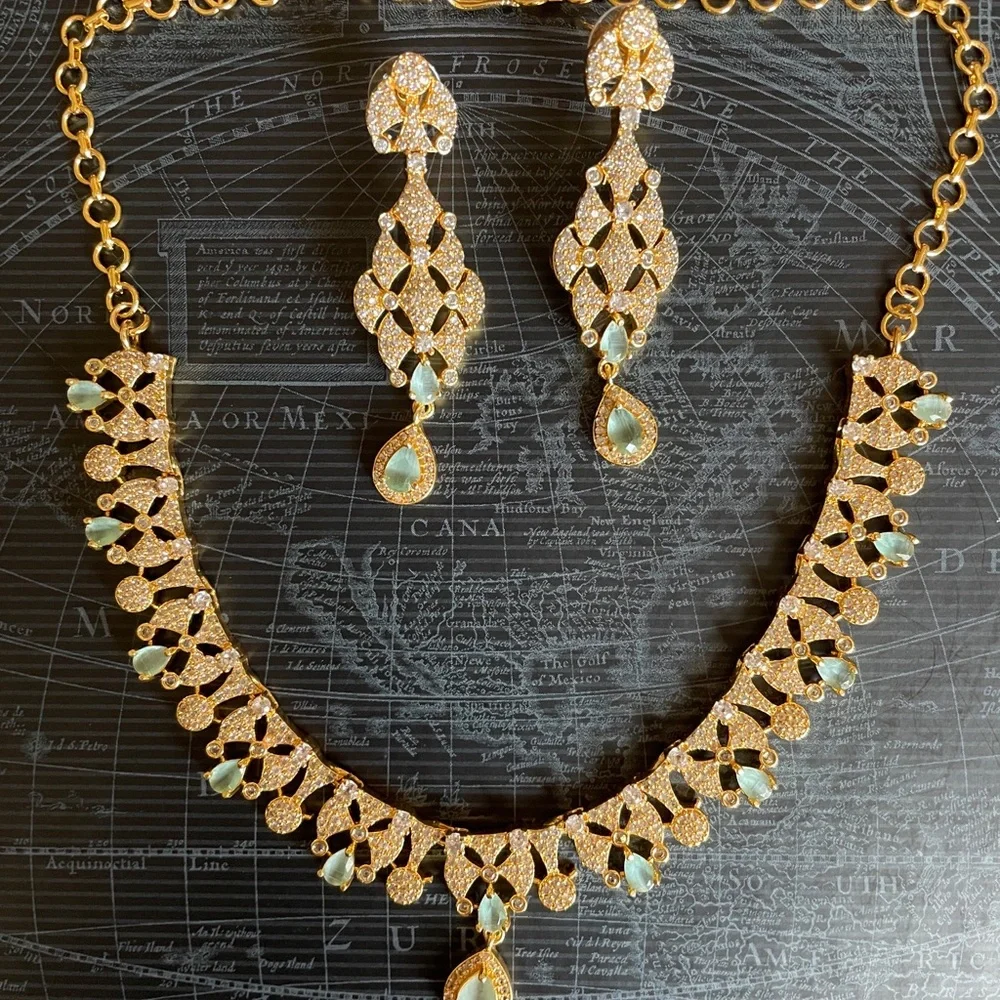 Elegant Gold-Tone Necklace & Drop Earring Set with Pale Green Gem Accents